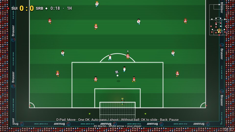 Kick-Buum gameplay on a TV: top-down pitch, attack on the penalty area, scoreboard and pitch radar